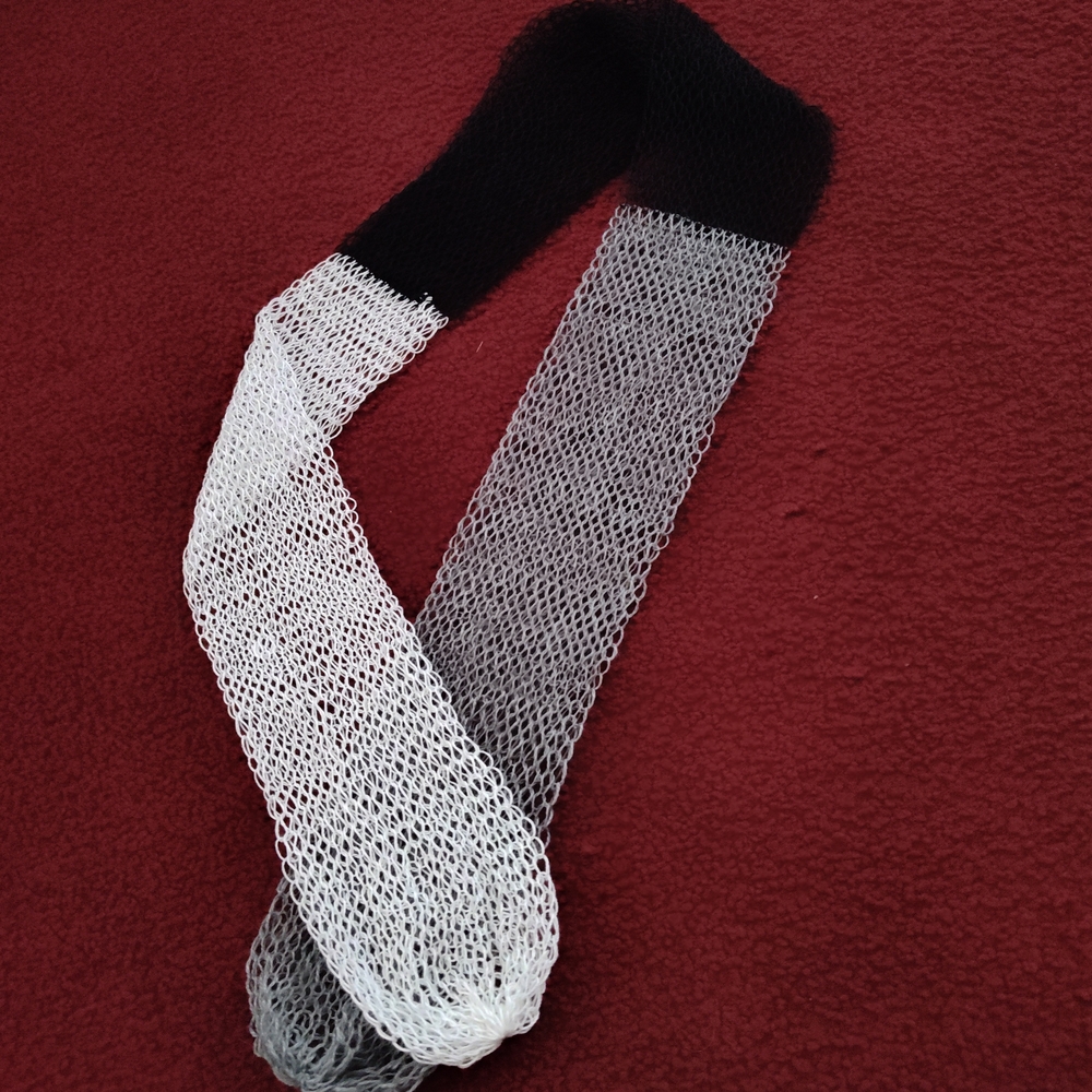 Elegant Black and White Knit Scarf